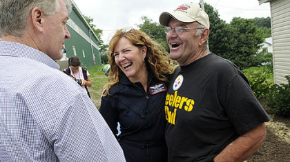 Quecreek mine survivor John Unger, right, shares a laugh Saturday with Jill Stull, a flight nurse for Conemaugh Memorial Medical Center, and former Gov. Mark Schweiker at the 10th anniversary celebration of the rescue at the site of Quecreek Mine in Somerset.