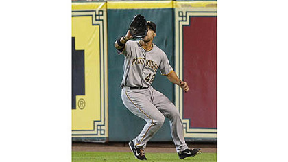 Pirates' Garrett Jones catches a ball for an out against the Houston Astros in the fourth inning.