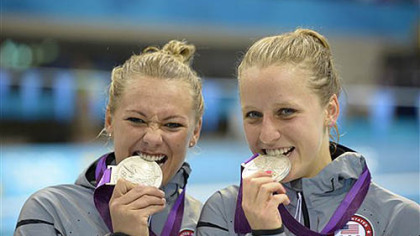 US Silver medalists Kelci Bryant, left, and Abigail Johnston pose with their medals during the 3 Meter Synchronized Springboard final at the the 2012 Summer Olympics in London, Sunday, July 29, 2012.