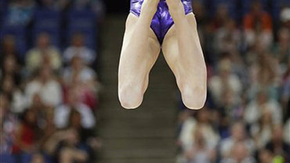 U.S. gymnast Kyla Ross performs on the balance beam during the Artistic Gymnastics women's qualification at the 2012 Summer Olympics, Sunday, July 29, 2012, in London.
