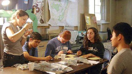 Students at the National Youth Science Camp, held at Camp Pocahontas in West Virginia, study the effects of carnivorous juices from pitcher plants.