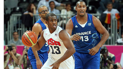 Chris Paul moves the ball upcourt in the U.S. men's basketball team's 98-71 win against France Sunday in London.