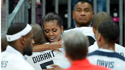First lady Michelle Obama congratulates Kevin Durant and the U.S. men's basketball team after its win.