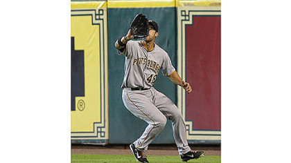 Pirates' Garrett Jones catches a ball for an out against the Houston Astros in the fourth inning.