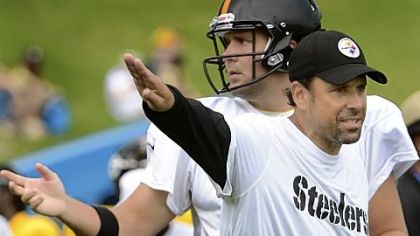 Steelers offensive coordinator Todd Haley gives instruction to quarterback Ben Roethlisberger in a workout at training camp at Saint Vincent College in Latrobe.