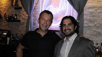 Yves Carreau, left, who created the restaurants Sonoma, Seviche and NOLA, stands with his business partner Peter Landis at Perle in Market Square, their new nightclub that has champagne on tap.