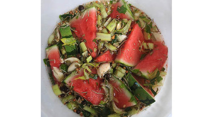 Pickling watermelon in a bucket.