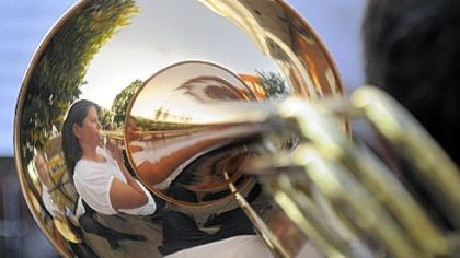 Tracey Sepe plays the trombone with the Penn-Trafford Community Band on Sunday.