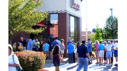 Patrons swarm Chick-fil-A at dinnertime Wednesday along Route 228 in Cranberry.