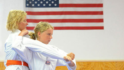 Georgia Berk, 13, practices judo today with her mother, Katherine, of Baldwin Borough, at Kim's Martial Arts & Fitness in Brentwood.