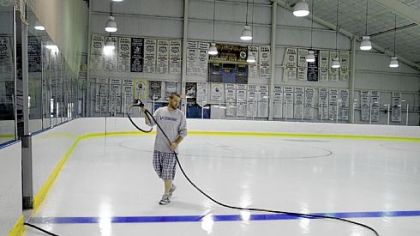 Chadd John of Lower Burrell does some regular ice maintenance Thursday at the Valley Sports Complex. The Sports Complex is expecting some upgrades in the near future, including new lighting and signage.