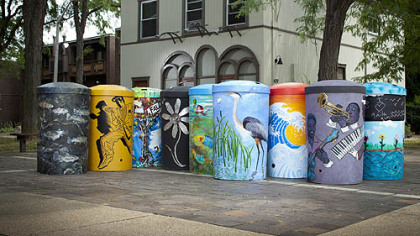 Rain barrels painted by local artists have been installed around the city as part of StormWorks Rain Barrels on Parade project.