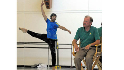 Artistic director Terrence Orr watches Alexandre Silva rehearse George Balanchine's "Sylvia Pas de Deux."