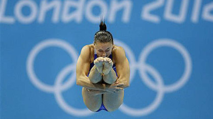 Kennedy native Cassidy Krug competes during the women's 3-meter springboard diving semifinal today.