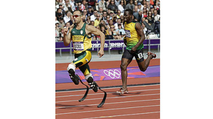 South Africa's Oscar Pistorius, a double amputee,  competes Saturday in a men's 400-meter heat.