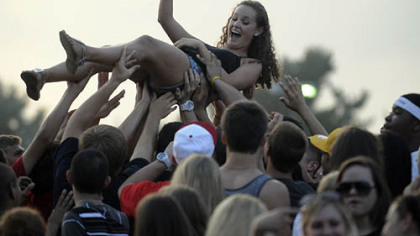 Crowd surfing before Mac Miller and Wiz Khalifa take the stage at First Niagara Pavilion.