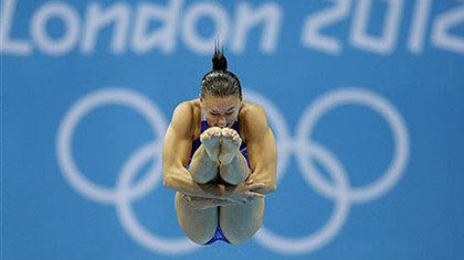Kennedy native Cassidy Krug competes during the women's 3-meter springboard diving semifinal today.