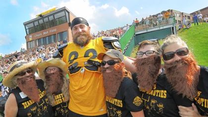 Brett Keisel poses with "Brett's Bearded Beauties" during afternoon workouts yesterday at Steeler Training Camp. Share your own training camp moments with the Steeler Nation at www.post-gazette.com/yourphotos