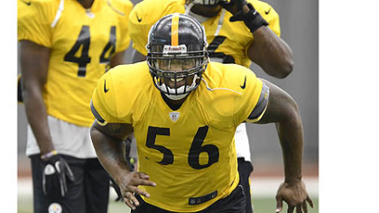 Steelers linebacker LaMarr Woodley rushes the passer during workouts at the Steelers South Side facility.