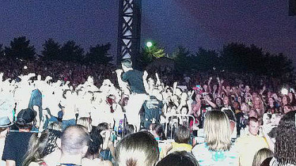 Logan Henderson of Big Time Rush ventures into the crowd
during Sunday's concert at the First Niagara Pavilion.