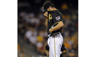 Reliever Jason Grilli allowed four runs in the eighth inning without recording an out before giving way to Chris Resop Tuesday at PNC Park.