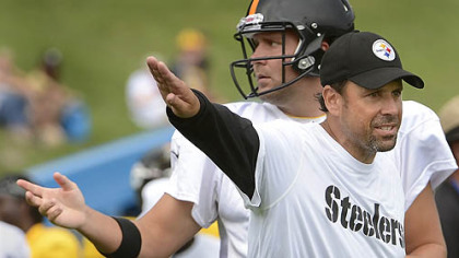 Steelers offensive coordinator Todd Haley gives instruction to quarterback Ben Roethlisberger during afternoon workouts at training camp.