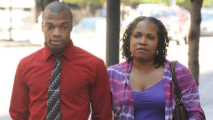 Jordan Miles and his mother, Terez Miles, arrive at the federal courthouse Wednesday morning.