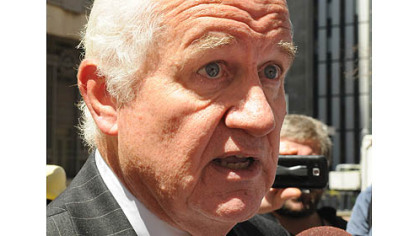 Bryan Campell walks away from the entrance to the Federal Courthouse after an eight-member jury decided in favor of three Pittsburgh police officers on Jordan Miles' accusations. Mr. Campbell was the attorney for City of Pittsburgh Police Officer Michael Saldutte. The judge ordered a mistrial on two of the counts.