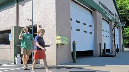 Voters leave the Evergreen Fire Company in Ross after casting their ballots Tuesday in the special election to fill the seat of former state Sen. Jane Orie, who resigned after being convicted of public corruption.