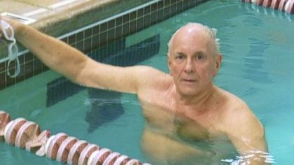 The Rev. Bruce Bryce of Whitehall swims to raise money for improvements to Baldwin Community United Methodist Church.