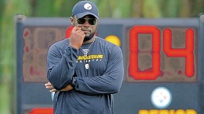Pittsburgh Steelers head coach Mike Tomlin watches the offense during training camp at St Vincent College in Latrobe.