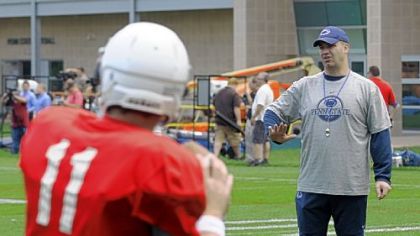 Penn State football coach Bill O'Brien works with the quarterbacks in practice Thursday.