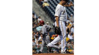 Diamondbacks' Jason Kubel heads toward third base after hitting a two-run home run against Pirates' Wandy Rodriguez in the first inning at PNC Park Thursday afternoon.