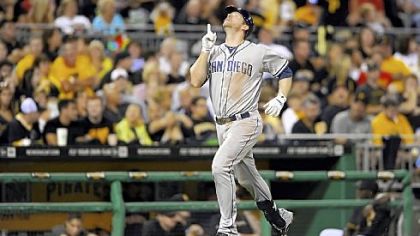 Padres' Chase Headley heads toward home plate after hitting a three-run home run against the Pirates in the fifth inning.