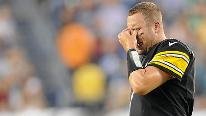 Steelers quarterback Ben Roethlisberger walks to the sidelines after getting sacked in the first quarter of last night's loss to Philadelphia.