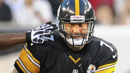 Pittsburgh Steelers quarterback Ben Roethlisberger feels the pressure from the Eagles defense just before getting sacked in the first quarter.