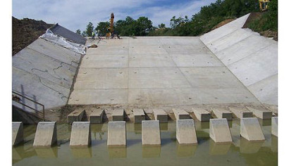 The new $5.1 million dam and spillway at Dutch Fork Lake was recently completed by the state Fish and Boat Commission. The lake should be refilled and restocked with fish by spring.