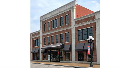The three-story brick office building at 735 Midland Ave. the Pennsylvania Cyber Charter School secured.