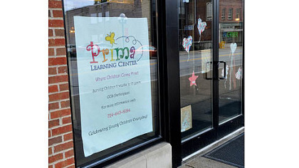 Prima Learning Center sign in the window of 735 Midland Ave.