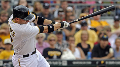 The Pirates' Clint Barmes hits a grand slam against the Padres in the fourth inning.