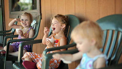 From left, Jessa Adkins, 4, of Manor, Lorelei Berger, 4, of Irwin, and Ava Adkins, 1, of Manor enjoy ice cream at Kerber's Dairy in Irwin. At any given time, Kerber's has about 40 flavors for sale.