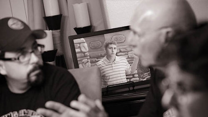 Carmen Capozzi meets with other members of Sage's Army in his Irwin home. They gather every Tuesday to discuss ways to raise awareness about the drug epidemic in the region.