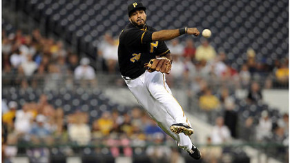 Pirates' Pedro Alvarez throws out Dodgers' Matt Kemp in the first inning Tuesday night at PNC Park.