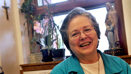 Susan English, posing for a portrait Tuesday, maintains about 25 clients at a time as a life coach and works out of the Benedictine Sisters of St. Benedict Monastery.