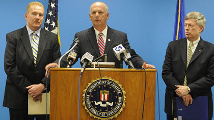 David Hickton (center) with Doug Perdue and Mark Nordenberg, Chancellor of the University of Pittsburgh.