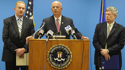 David Hickton (center) with Doug Perdue and Mark Nordenberg, Chancellor of the University of Pittsburgh.