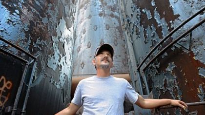 Ron Baraff, with the Rivers of Steel National Heritage Area, walks through the Carrie Furnace Aug. 1 in Rankin.